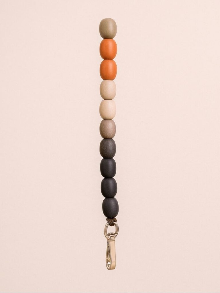Rekrill decorative bag strap made of biopolymer tiny rocks