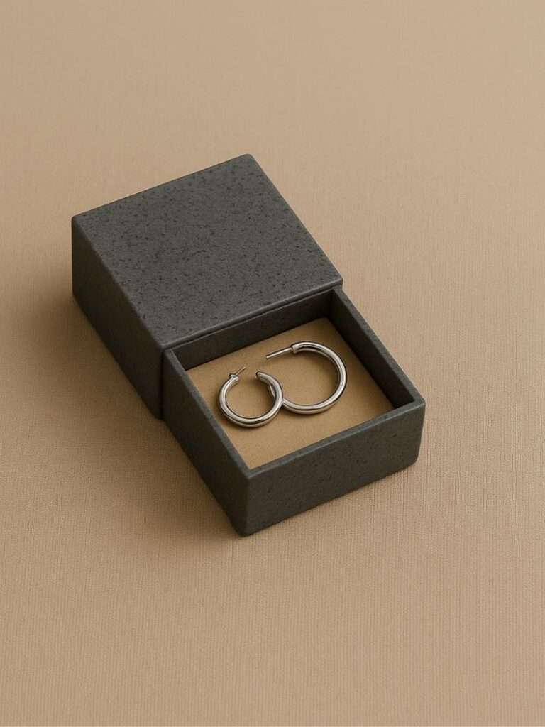 Sustainable packaging materials for earrings made from Rekrill biopolymer